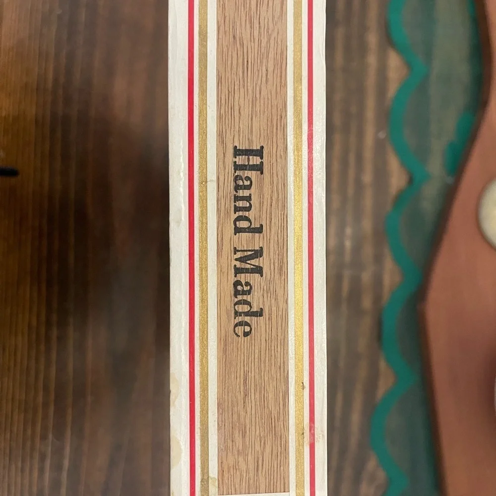 White and Red Storage Box with Decorative Emblem